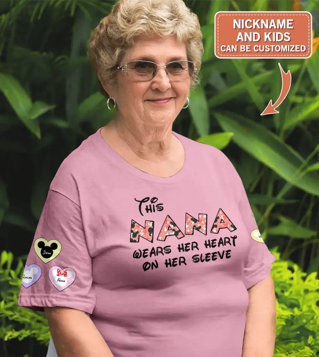 Personalized Mother's Day AOP T-Shirt - Up to 10 Kids - Mother's Day Gift Idea for Mom/Grandma - This Mom/Nana Wears Her Heart On Her Sleeve