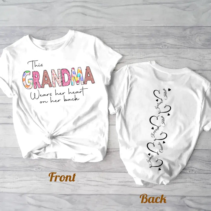 Personalized Grandma AOP T-Shirt - Up to 6 Kids - Mother's Day Gift Idea For Grandma - This Grandma Wears Her Heart On Her Back