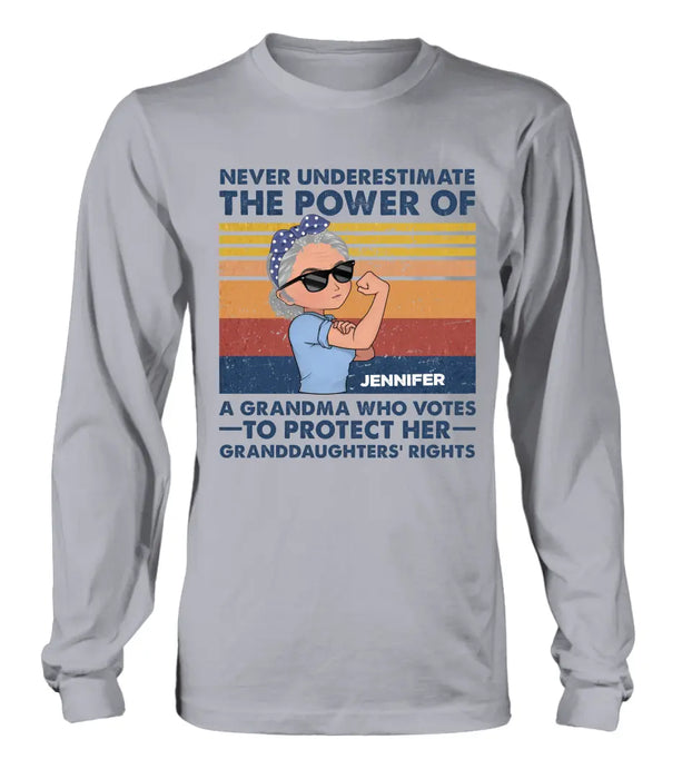 Personalized Grandma Votes T-shirt/Long Sleeve/Sweatshirt/Hoodie - Gift Idea For Grandma - Never Underestimate The Power Of A Grandma Who Votes To Protect Her Granddaughters' Rights